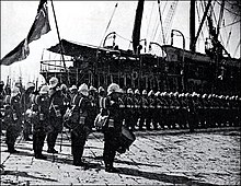 1st Battalion Scots Guards disembarking at Alexandria on 12 August 1882 ScotsGuardsAlexandria1882.jpg