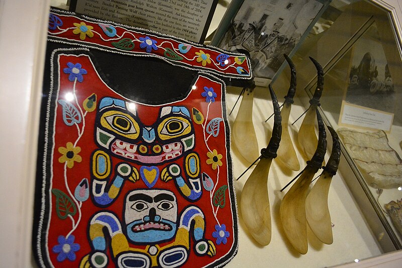 File:Sheldon Jackson Museum - beaded 'panting wolf' chest piece and six Mountain goat-horn spoons by Ralph Walton.jpg
