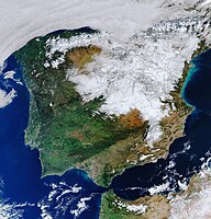 Satellitbild över halvön med snötäckta delar efter stormen Filomena