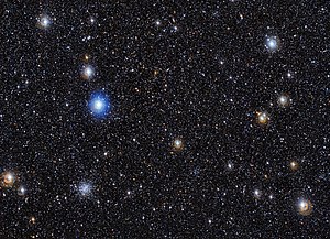 Galaxy clusters are the largest known gravitationally bound structures in the universe. Spot the cluster.jpg