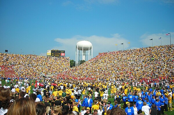 Fans rush the field after Iowa's 27–17 football victory over Iowa State on September 16, 2006.