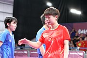 Deutsch: Tischtennis bei den Olympischen Jugendspielen 2018; Tag 9, 15. Oktober 2018; Mixed, Finale, Mixed-Doppel – Miu Hirano & Tomokazu Harimoto (JPN) gegen Sun Yingsha & Wang Chuqin (CHN) 1:3 English: Table tennis at the 2018 Summer Youth Olympics at 15 October 2018 – Mixed Final, Mixed-Double – Miu Hirano & Tomokazu Harimoto (JPN) Vs Sun Yingsha & Wang Chuqin (CHN) 1:3