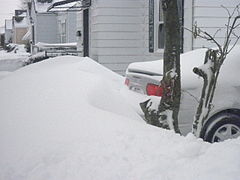 A snowdrift blocks a car in Kenosha, Wisconsin, United States