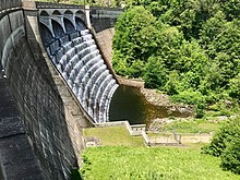 The Nepaug Dam The Nepaug Dam allows water to flow into the Nepaug Reservoir.jpg