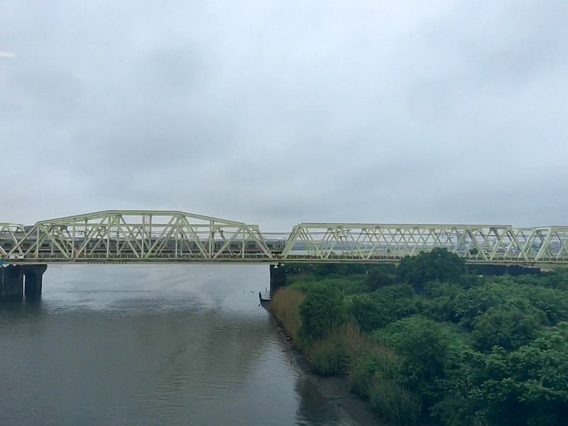 File:Train over Arakawa river 2022 May 13 various.jpeg