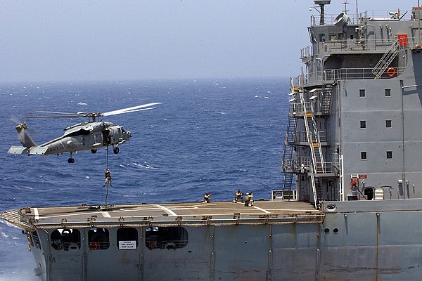 US Navy SEALs demonstrate VBSS techniques for the 2004 Joint Civilian Orientation Conference.