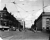 Third Street looking east. The lower level of the Union Savings Bank is shown at right before the upper floors were added. Union Savings Bank & Trust.jpg