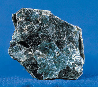 <span class="mw-page-title-main">Vermiculite</span> Hydrous phyllosilicate mineral which expands significantly when heated