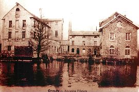 Udsigt over industribygninger på et postkort fra 1900'erne.