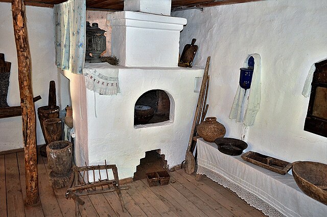 A typical Russian stove placed at a corner of a wall, in the Ilovlinsky Museum, Ilovya, Ilovlinsky District, Volgograd Oblast, Russia.