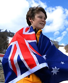 Ben Tudhope was given the honour of carrying the flag for Australia at the Closing Ceremony 160314 - Closing flag Tudhope Sochi 14 - 3b.jpg