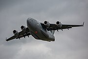 A Boeing C-17 Globemaster III, tail number 95-0103, taking off from RAF Mildenhall in the United Kingdom. It is assigned to the 62nd Airlift Wing and the 446th Airlift Wing at Joint Base Lewis McChord in Washington, USA.