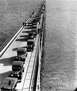 Aerial view of cars and pedestrians, 1935 Aerial view of cars and pedestrians on the Hornibrook Highway Bridge Redcliffe 1935 (7960321652).jpg
