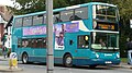 English: Arriva Guildford & West Surrey 6403 (GN04 UDS), a Volvo B7TL/TransBus ALX400, coming under Victoria Arch (from Victoria Way onto Victoria Road), Woking, Surrey, on route 34. Two B7TLs, 6402 and 6403, arrived at Guildford at the end of August 2009, to displace the step entrance Dennis Dominators (5214 and 5215). 6402 and 6403 were new to Gillingham depot - in the Arriva Medway Towns part of Arriva Southern Counties - in 2004, as part of "Operation Overdrive", where a large batch of buses were purchased to upgrade the fleet in one go. 6403 had only just returned from the paint shop when this photo was taken, having received interurban livery - this was the first sighting. The bus was heavily delayed by and stuck in a queue due to the 2009-2010 gas roadworks in Guildford Road. Unfortunately, when the temporary traffic lights went green, the bus had to stop at a bus stop, and so missed the lights, as did all the cars behind it which thought it had stopped in a queue and so didn't go round it!