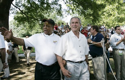Mays walks with President George W. Bush, July 30, 2006