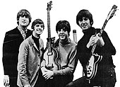 The Beatles are known as "The Fab Four". Beatles ad 1965 just the beatles crop.jpg