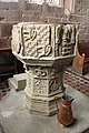 * Nomination Font at St Chad, a Grade I Listed Building in Holt, Wrexham, Wales. It sits at the SW end of the church and has an octagonal bowl which is carved with faces and stems with heraldic motifs including the fleur-de-lis of Henry VII and the stag head represents the Stanleys; c.1483. --Llywelyn2000 05:52, 16 September 2017 (UTC) * Promotion Good quality. --Poco a poco 11:49, 16 September 2017 (UTC)