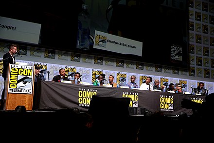 (L:R) Moderator Chris Hardwick, Feige, Coogler, and the cast of Black Panther at the 2017 San Diego Comic-Con
