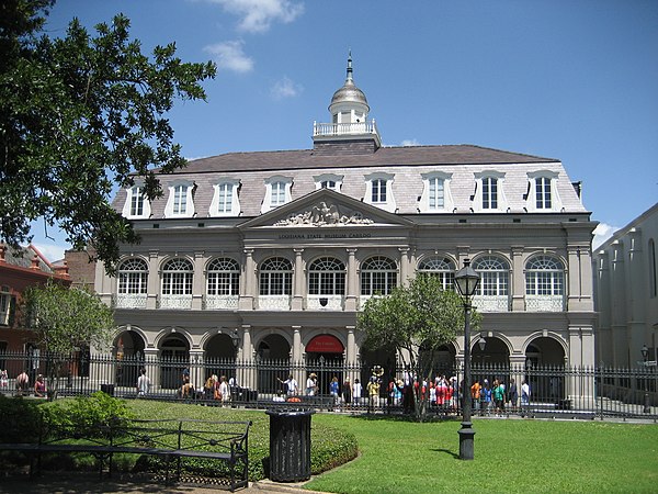 The Cabildo has Spanish arches with a French mansard roof.