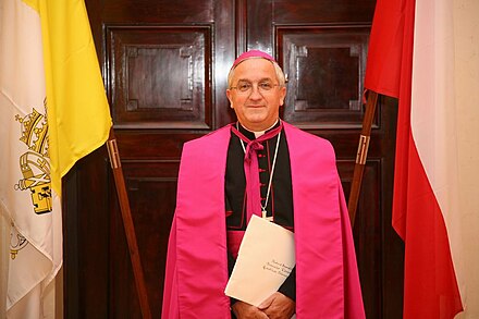Archbishop Celestino Migliore, Apostolic Nuncio to Poland, wearing his purple ferraiolo