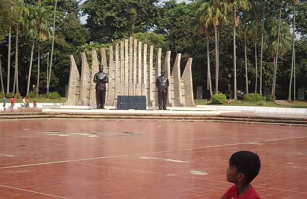 Children playing in Proclamation Park, the site of the 1945 Indonesian proclamation of independence; monument designed by Nyoman Nuarta