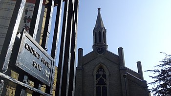 Church Grove Gate opposite St John's church, Hampton Wick, is the park's closest gate to Kingston Bridge and Kingston Town centre. Church Grove Gate.jpg