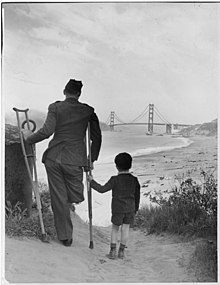 Disabled veteran with a child Disabled veteran - NARA - 195917.jpg