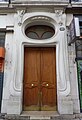 Porte du 20 avenue Felix Vialet du bâtiment de style Art Nouveau au 6 rue du docteur Mazet, Grenoble.