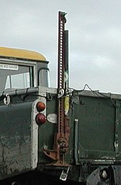 A farm jack attached to a vehicle Farm jack.jpg