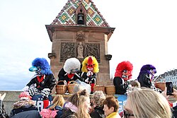 Five Gugge at Fasnacht Basel 2024 on Mittlere Brucke 03.jpg