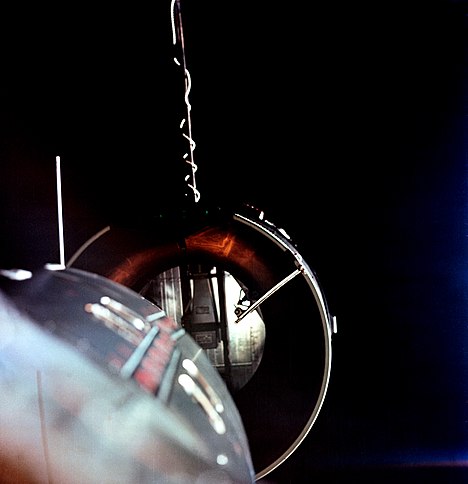 The Gemini 8 approaches the docking collar of the Agena target vehicle.