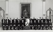 Elizabeth II with her Cabinet in the ballroom of Rideau Hall, on Dominion Day, 1 July 1967, the centennial of Confederation Her Majesty Queen Elizabeth II and her Canadian Ministers at Rideau Hall 1 July 1967.jpg