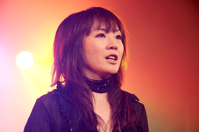 Okui performing as part of JAM Project in Paris