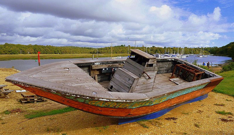 Described as an 'indigenous boat', Daniel Craig is seen driving this boat in a high speed chase. In fact a stunt driver was hidden in a compartment in front of the steering wheel. It is seen here at Buckler's Hard where it was on display to coincide with an exhibition of Bond vehicles at the nearby National Motor Museum at Bealieu