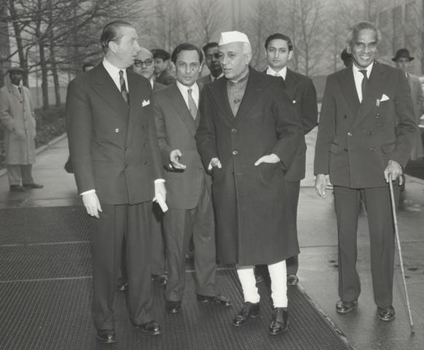 1st Prime Minister of India Jawaharlal Nehru with V. K. Krishna Menon (age 60) in United Nations in December 1956.