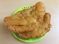 Jiguanjiao, fried jiguan dumpling (shaped like a chicken comb)