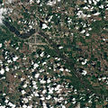 Natural-colour satellite image of Minot taken just as the River Souris reached its historic crest.