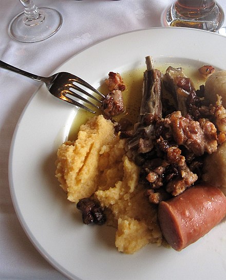 A Christmas meal with pinnekjøtt, sausages and puréed swede.
