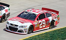 Harvick competing in the 2013 STP Gas Booster 500 at Martinsville Speedway. Kevin Harvick, 2013 STP Gas Booster 500.JPG