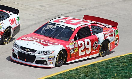 Harvick competing in the 2013 STP Gas Booster 500 at Martinsville Speedway.