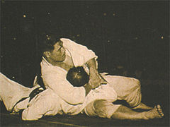 Image 47Masahiko Kimura vs. Hélio Gracie, a 1951 bout between Japanese judo fighter Masahiko Kimura and Brazilian jiu jitsu founder Hélio Gracie in Brazil, was an early high-profile mixed martial arts bout. (from Mixed martial arts)