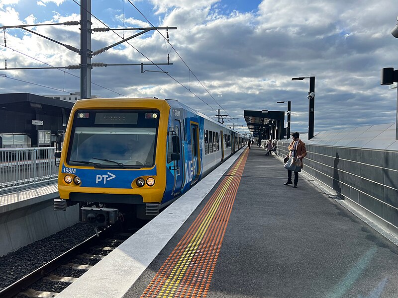File:Mernda line train at elevated platform of Bell station, Melbourne, July 2023.jpg