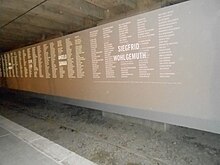 The wall of names at the Memoriale della Shoah Muro dei Nomi.JPG