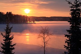 Ice fog on Pyhäjärvi, Tampere during sunset.