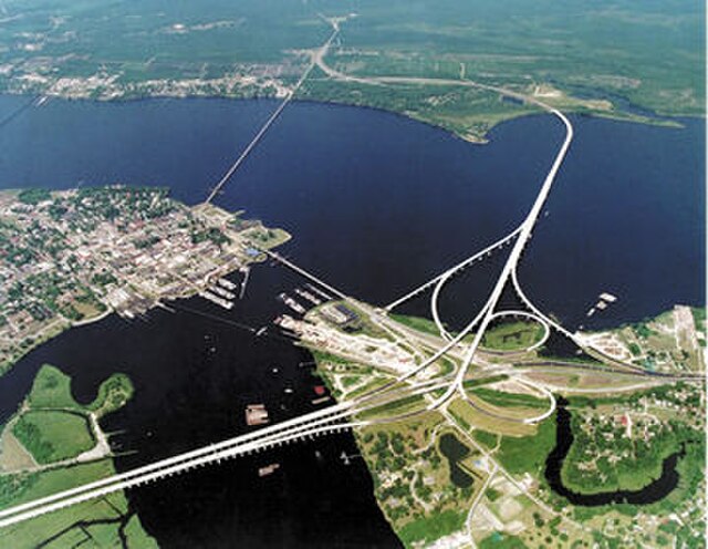 Aerial view of New Bern (center left) showing the confluence of Trent (bottom center) and Neuse (left to right) rivers.