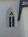Detail okna v presbyteriu u sakristie