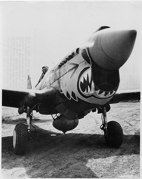 File:One of the redoubtable "Fliying Tigers" ready to take off from an Alaskan point in a Curtiss P-40 (Warhawk) fighter... - NARA - 196195.jpg