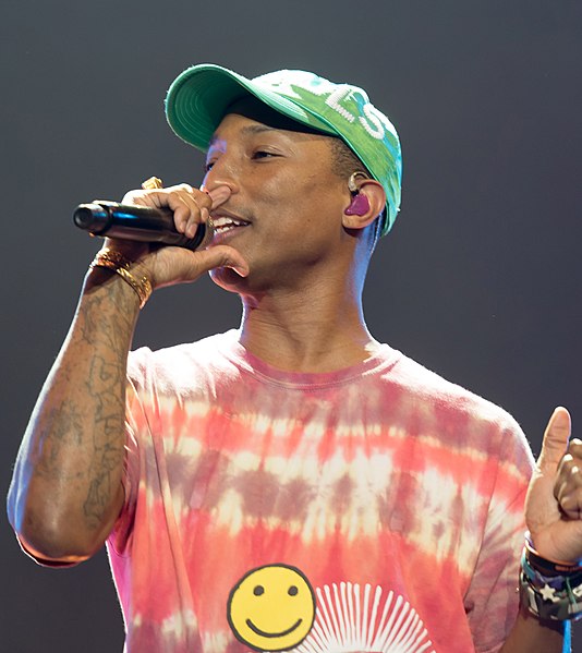 American artist Pharrell Williams helped create two tracks with Minogue, one of them being "I Was Gonna Cancel".