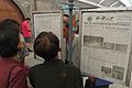 평양 지하철도에서 로동신문을 구독하고 있는 시민들