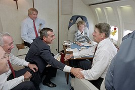 Ronald & Nancy Reagan, Ken Khachigian, Larry Speakes, Don Regan, and Dennis Thomas aboard Air Force One.jpg